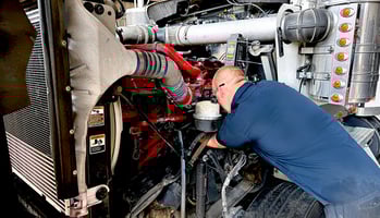 Onsite Fleet Maintenance - Technician working on a Semi Truck