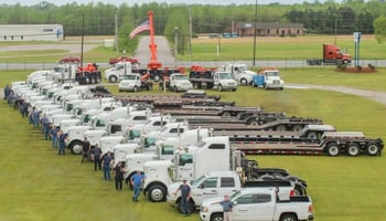 Truck Fleet - Row of Trucks Lined Up for Maintenance Services